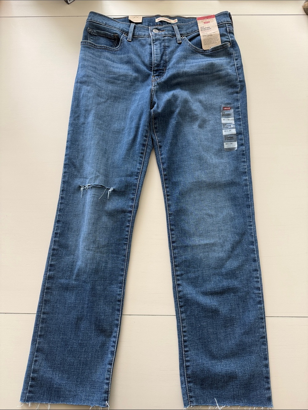 Levi's Men’s Medium Blue Straight Jeans with Knee Distress